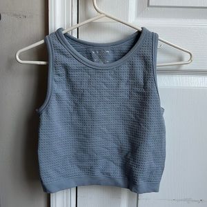 Fits me (S) and my mom (L). Basically a one size fits all. Barely ever worn.